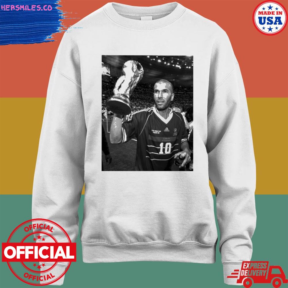 France's Zinedine Zidane holds the world cup 1998 T-shirt France's Zinedine Zidane holds the world cup 1998 T-shirt