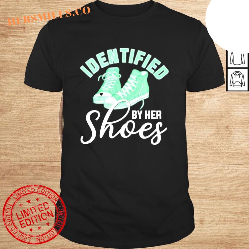 Identified by her shoes shirt