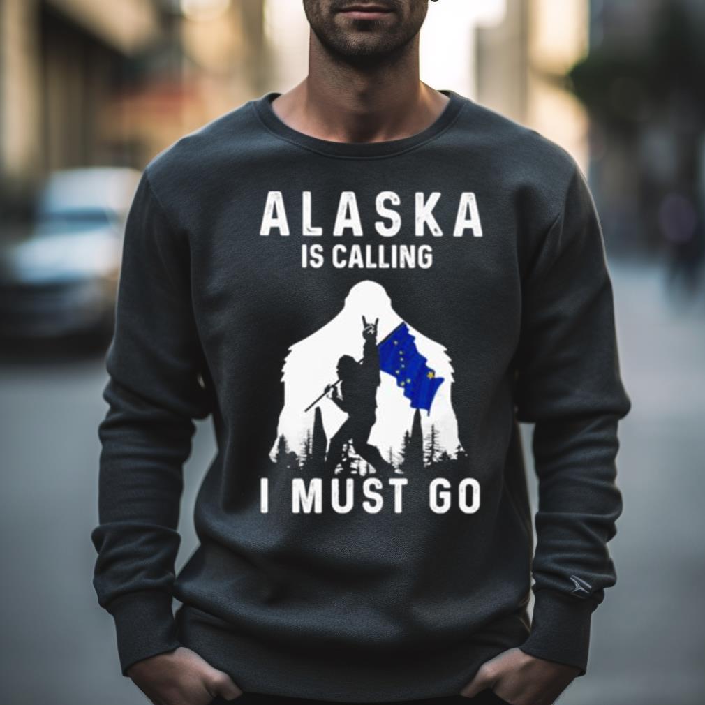 Alaska Is Calling I Must Go Bigfoot Flag Shirt